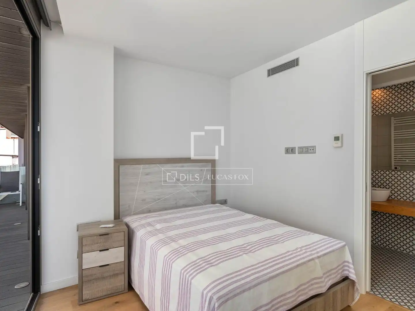 Schlafzimmer von Wohnung zum Verkauf in Lloret de Mar mit Klimaanlage, Terrasse und Schwimmbad