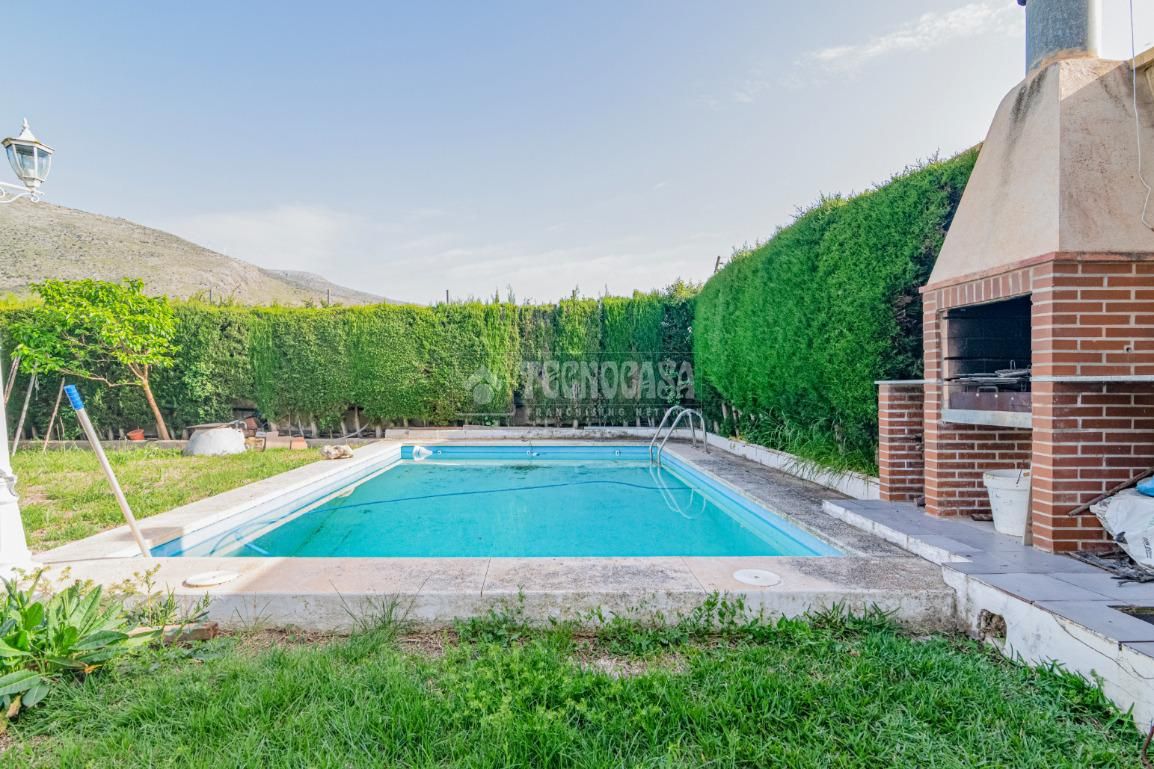 Swimming pool of Single-family semi-detached for sale in Loja  with Air Conditioner, Terrace and Storage room