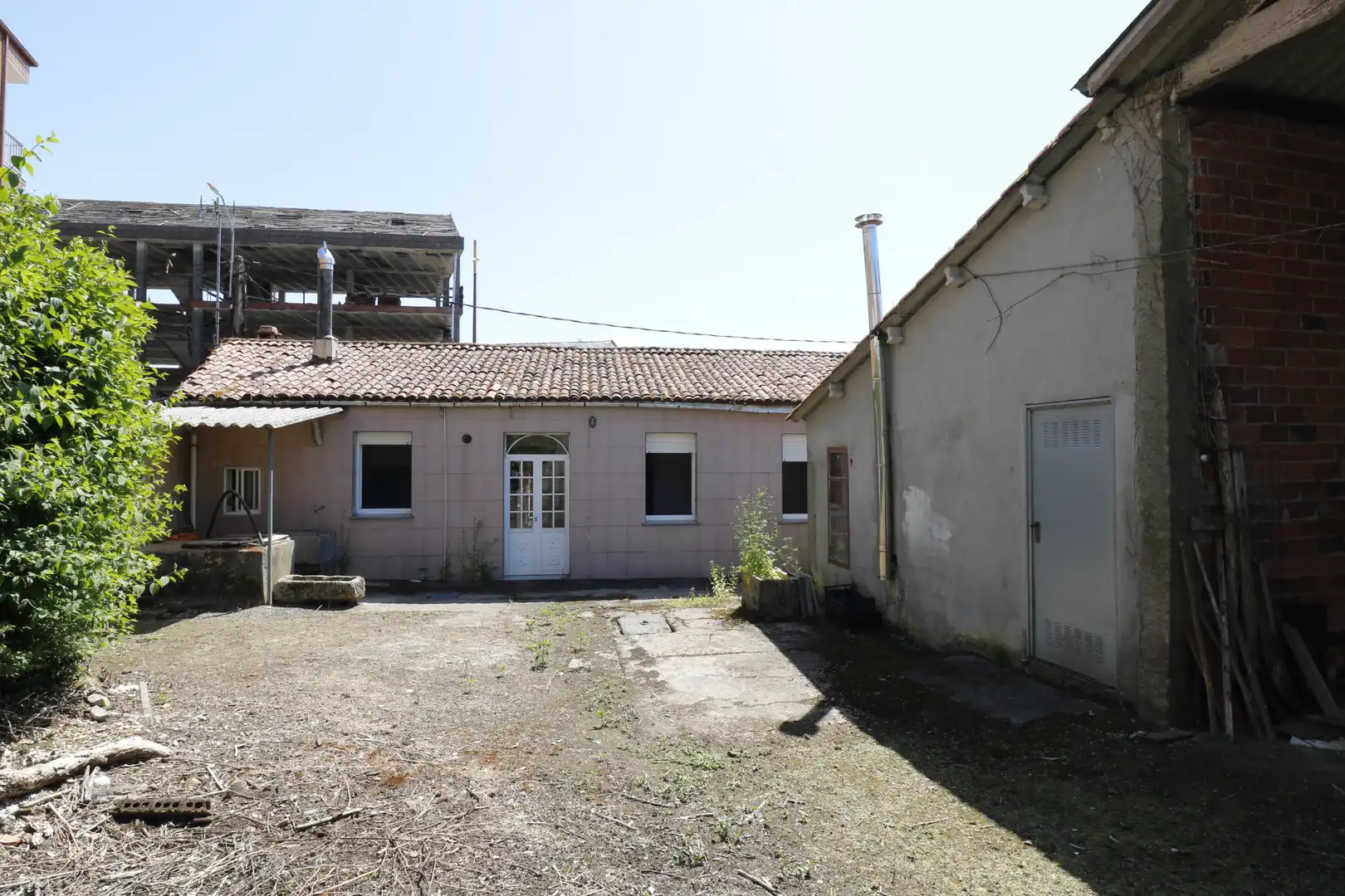 Vista exterior de Casa adosada en venta en Curtis con Calefacción, Jardín privado y Amueblado