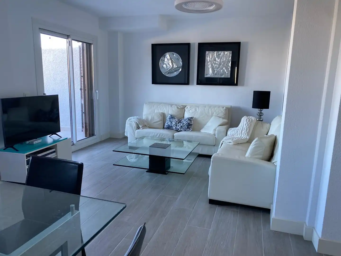 Sala de estar de Dúplex en venta en La Manga del Mar Menor con Aire acondicionado, Calefacción y Jardín privado