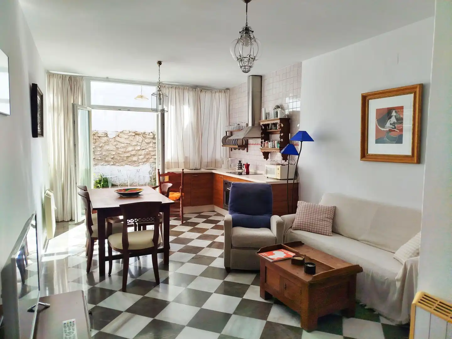 Sala d'estar de Casa adosada en venda en Mancha Real amb Balcó