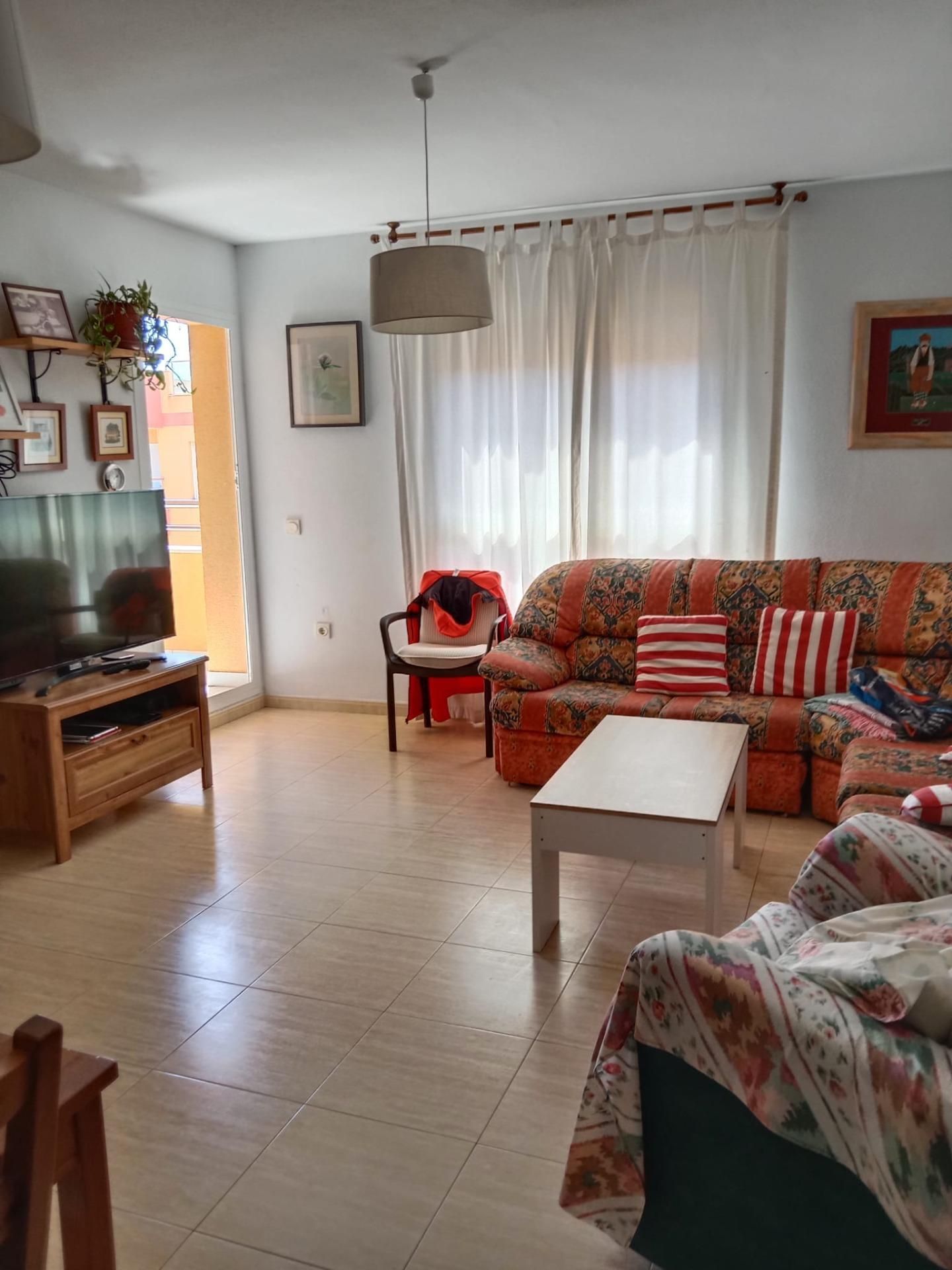 Sala de estar de Piso de alquiler en Roquetas de Mar con Aire acondicionado, Jardín privado y Piscina