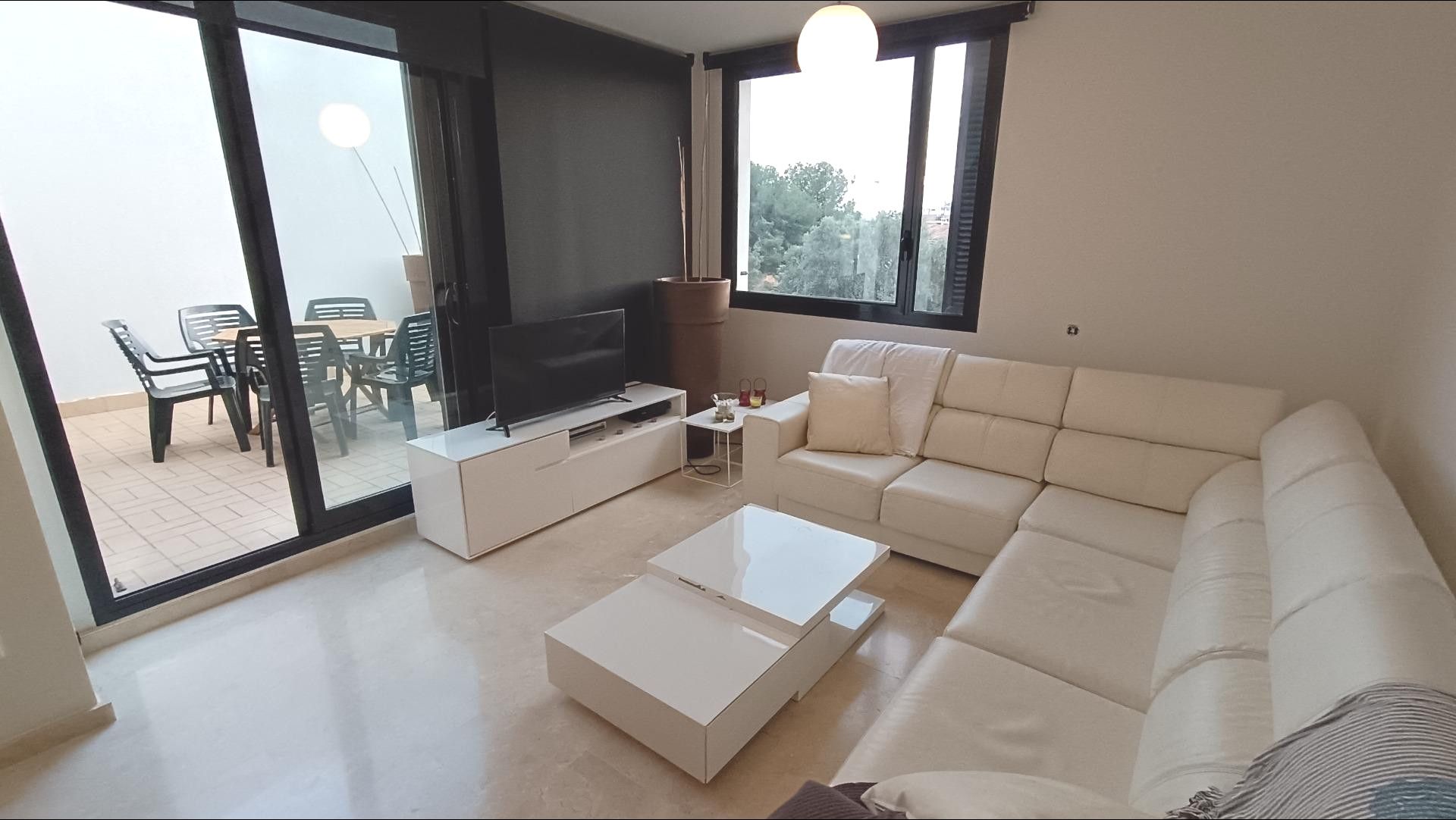 Sala d'estar de Casa adosada de lloguer en Calafell amb Calefacció, Jardí privat i Terrassa