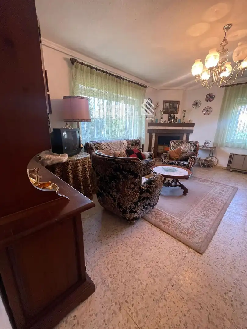 Sala de estar de Casa o chalet en venta en Doñinos de Salamanca con Calefacción y Amueblado