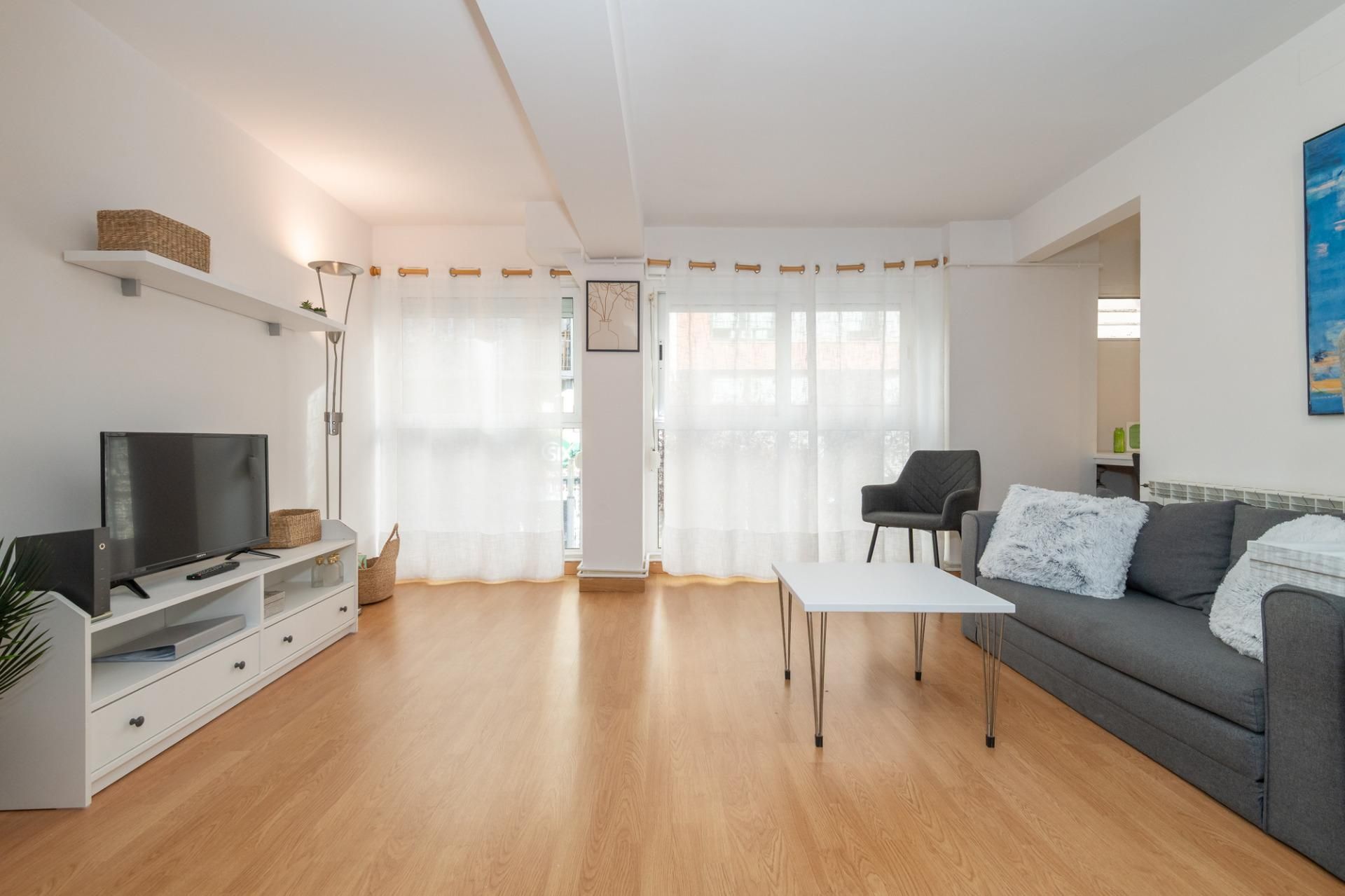 Sala d'estar de Apartament de lloguer en Girona Capital amb Calefacció