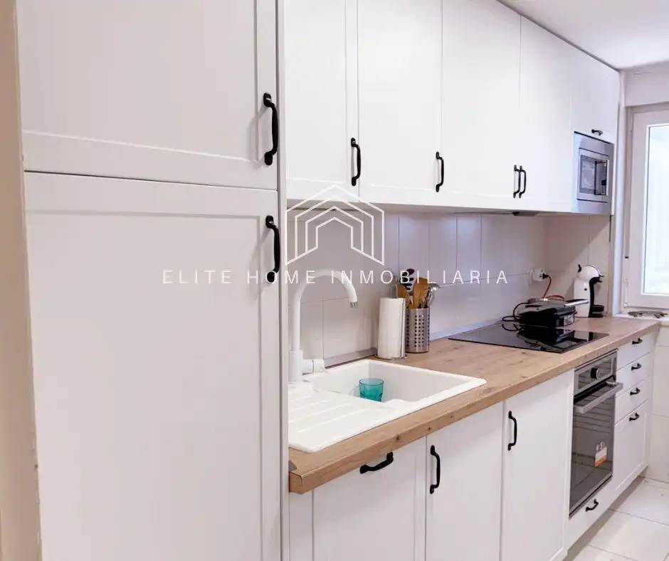 Cuina de Apartament en venda en Benicasim / Benicàssim amb Jardí privat, Terrassa i Moblat
