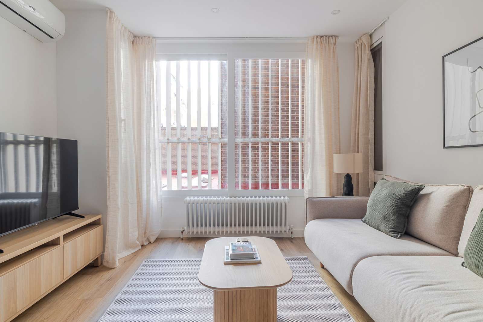 Sala d'estar de Apartament per a compartir en  Madrid Capital amb Aire condicionat i Terrassa