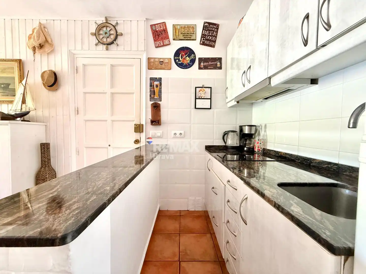 Cuina de Apartament en venda en Tossa de Mar amb Jardí privat, Balcó i Piscina comunitària