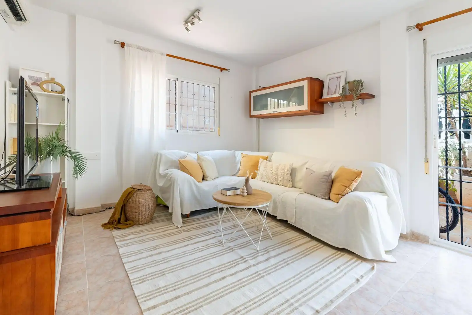 Sala d'estar de Casa adosada en venda en Cullera amb Aire condicionat, Calefacció i Terrassa