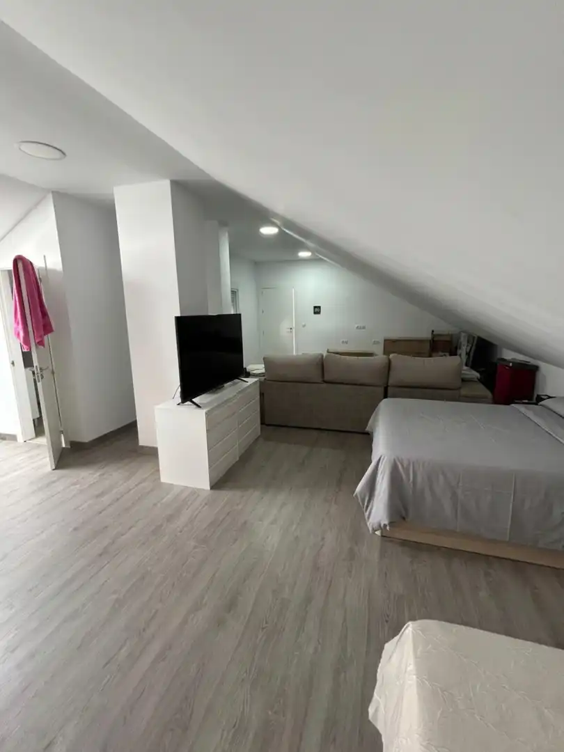 Sala de estar de Casa adosada en venta en Málaga con Aire acondicionado