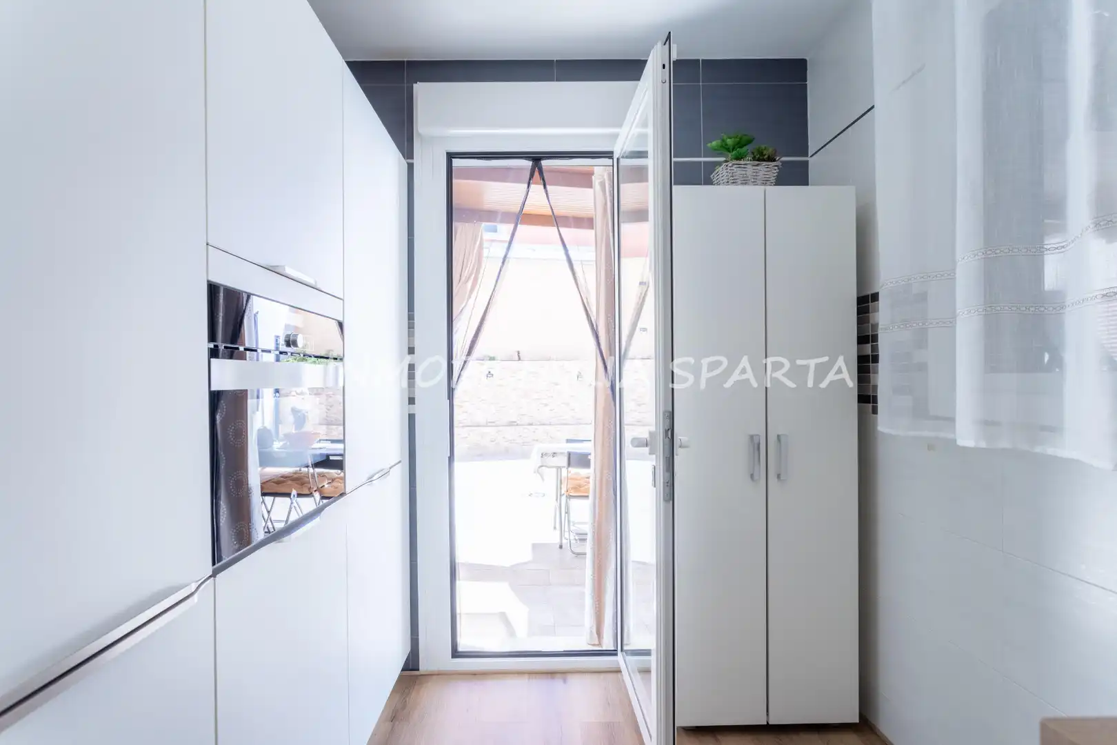 Cocina de Casa adosada en venta en Villanueva del Ariscal con Aire acondicionado, Calefacción y Jardín privado