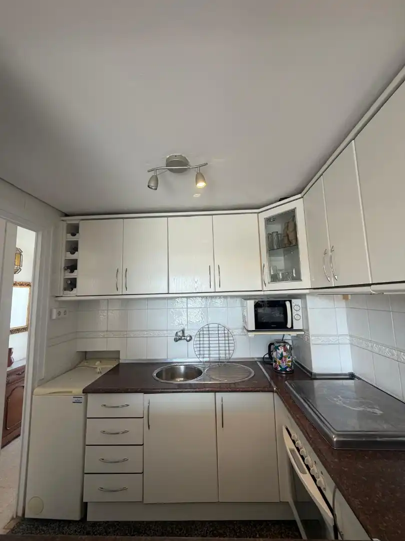 Cuina de Apartament en venda en Torremolinos amb Traster, Balcó i Piscina comunitària