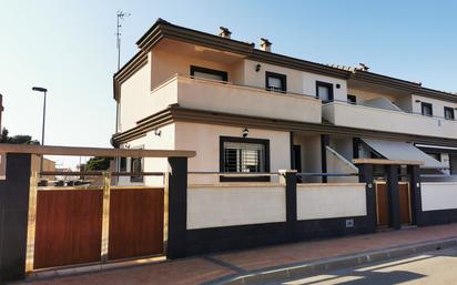 Vista exterior de Casa adosada en venda en San Javier amb Terrassa i Balcó