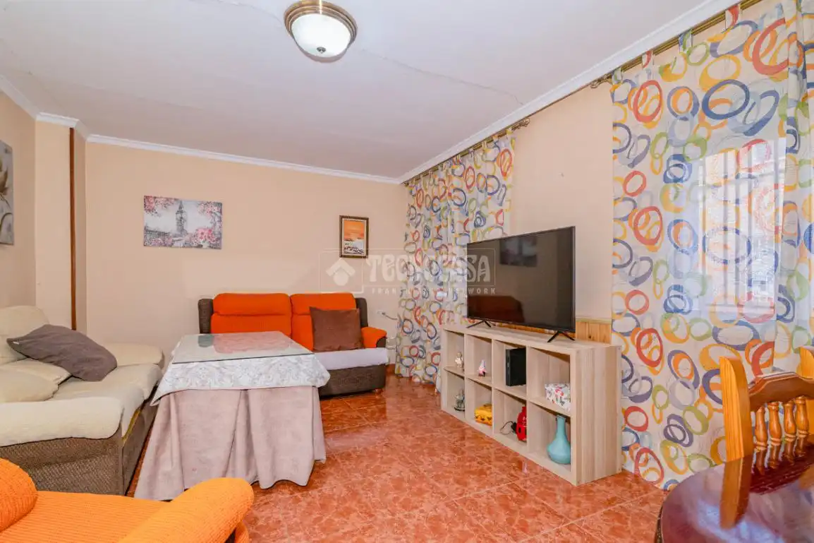 Sala de estar de Casa adosada en venta en Alhendín