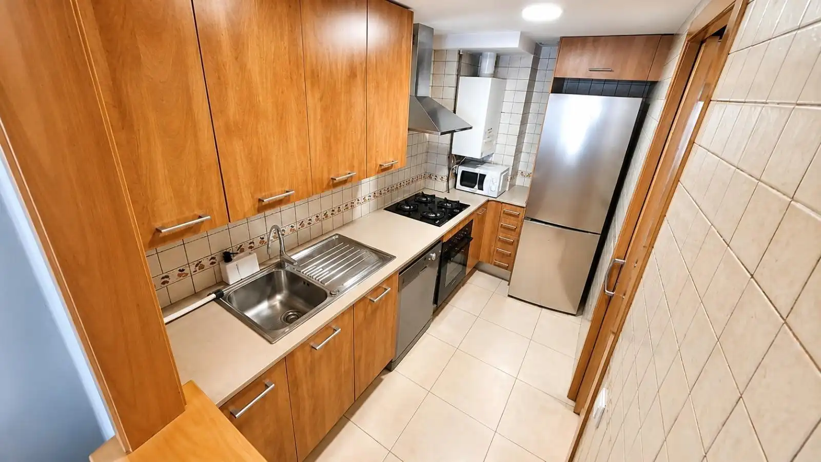Kitchen of Flat for sale in Sitges  with Air Conditioner, Heating and Balcony