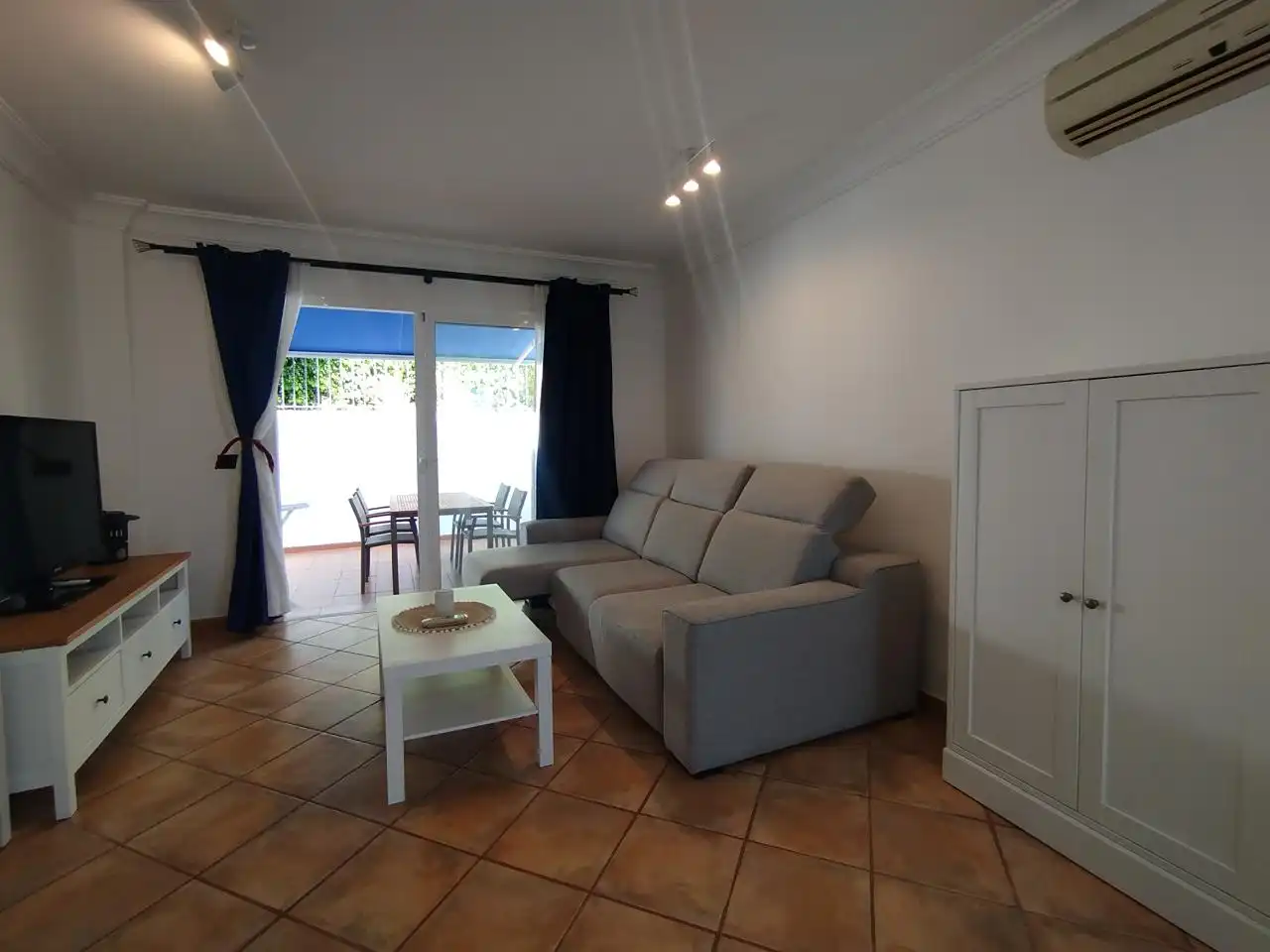 Sala d'estar de Casa adosada de lloguer en Mogán amb Aire condicionat, Terrassa i Es permeten mascotes