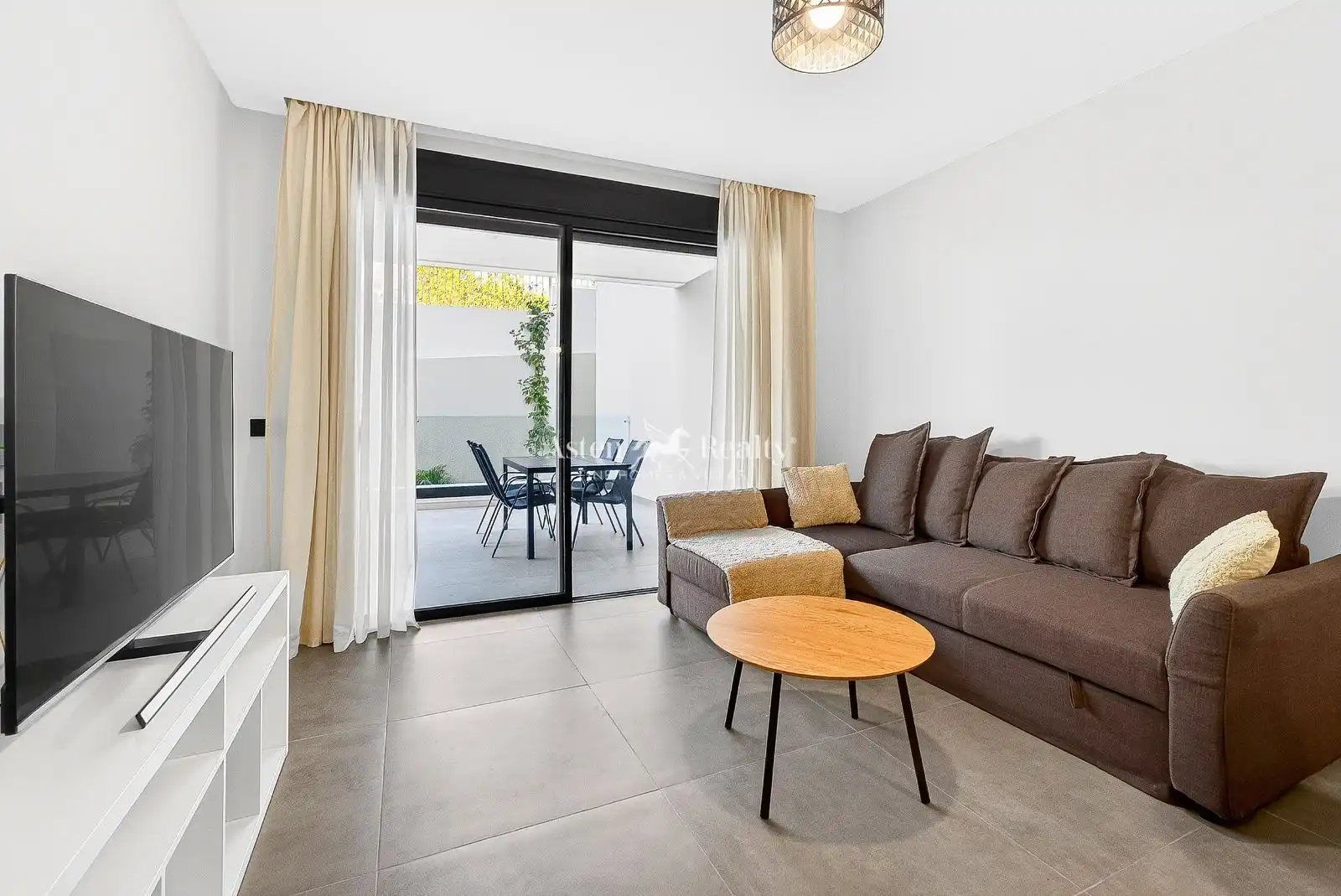 Sala d'estar de Apartament en venda en Adeje amb Aire condicionat, Terrassa i Traster