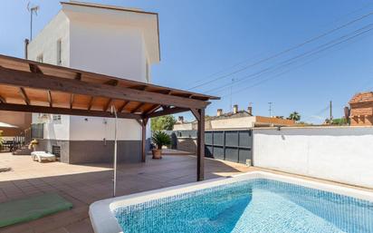 Swimming pool of Single-family semi-detached for sale in  Granada Capital  with Air Conditioner, Heating and Private garden