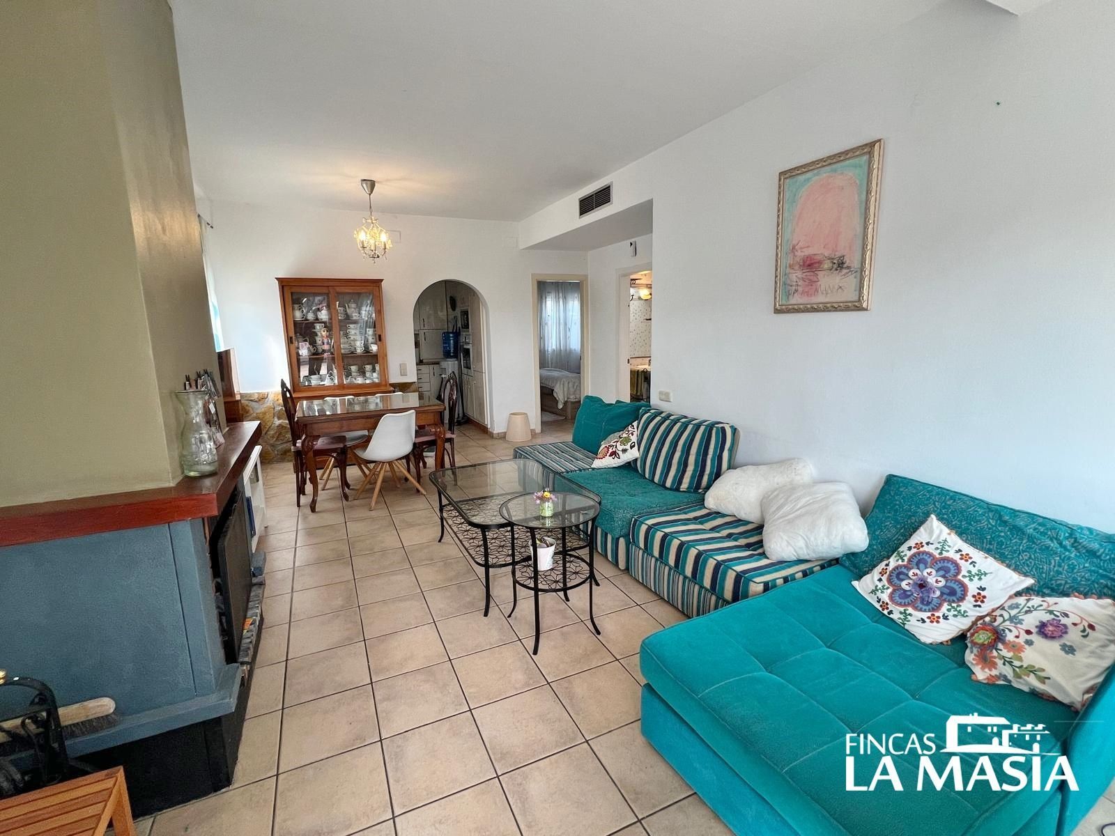Sala d'estar de Casa adosada en venda en Olivella amb Aire condicionat, Calefacció i Jardí privat