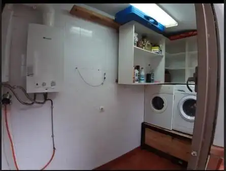 Küche von Einfamilien-Reihenhaus zum Verkauf in La Algaba mit Klimaanlage, Heizung und Terrasse