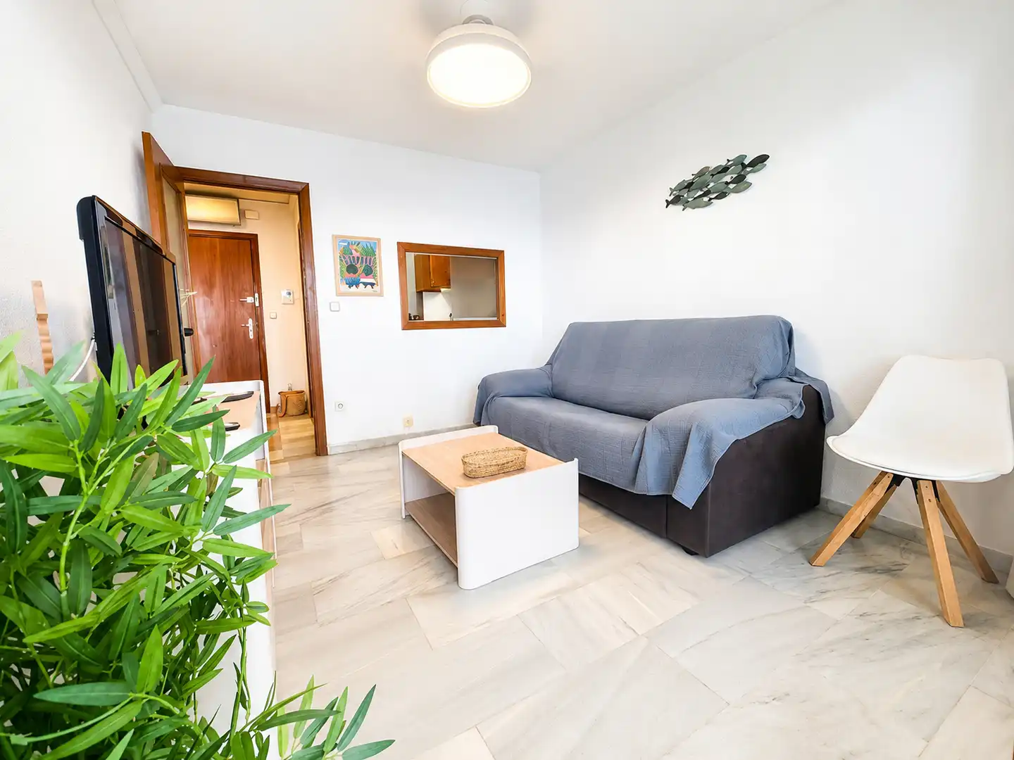 Sala d'estar de Apartament de lloguer en Benidorm amb Aire condicionat, Terrassa i Moblat