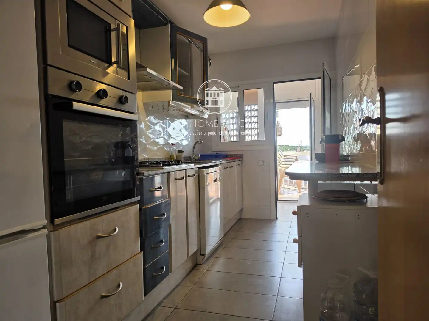 Kitchen of Flat for sale in Roda de Berà  with Terrace, Swimming Pool and Community pool