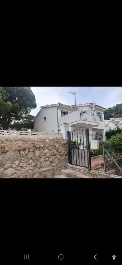 Vista exterior de Casa adosada en venda en L'Ametlla de Mar  amb Aire condicionat, Jardí privat i Parquet