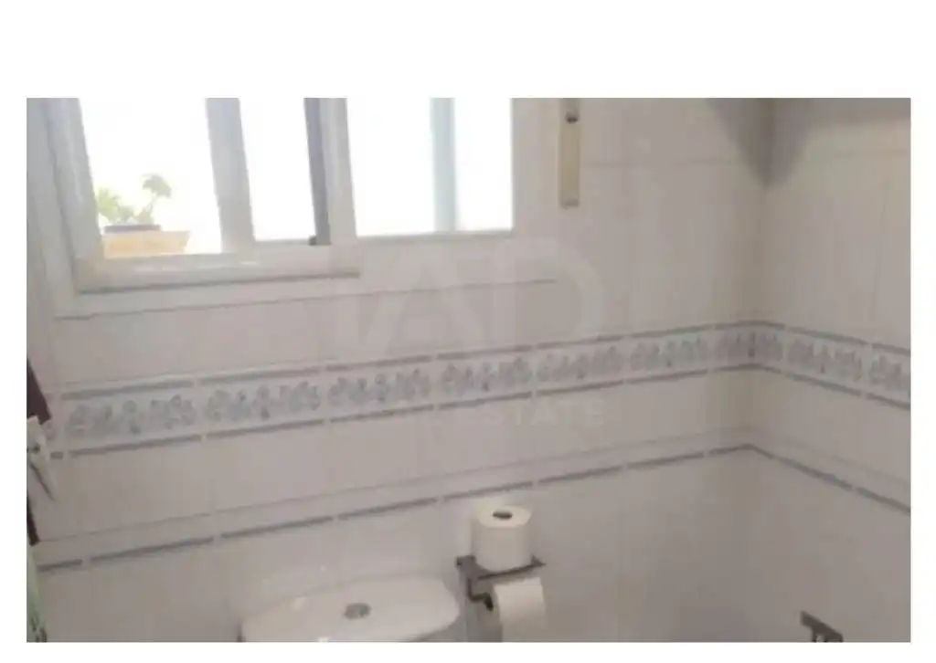 Baño de Casa adosada en venta en Lepe con Calefacción, Terraza y Piscina