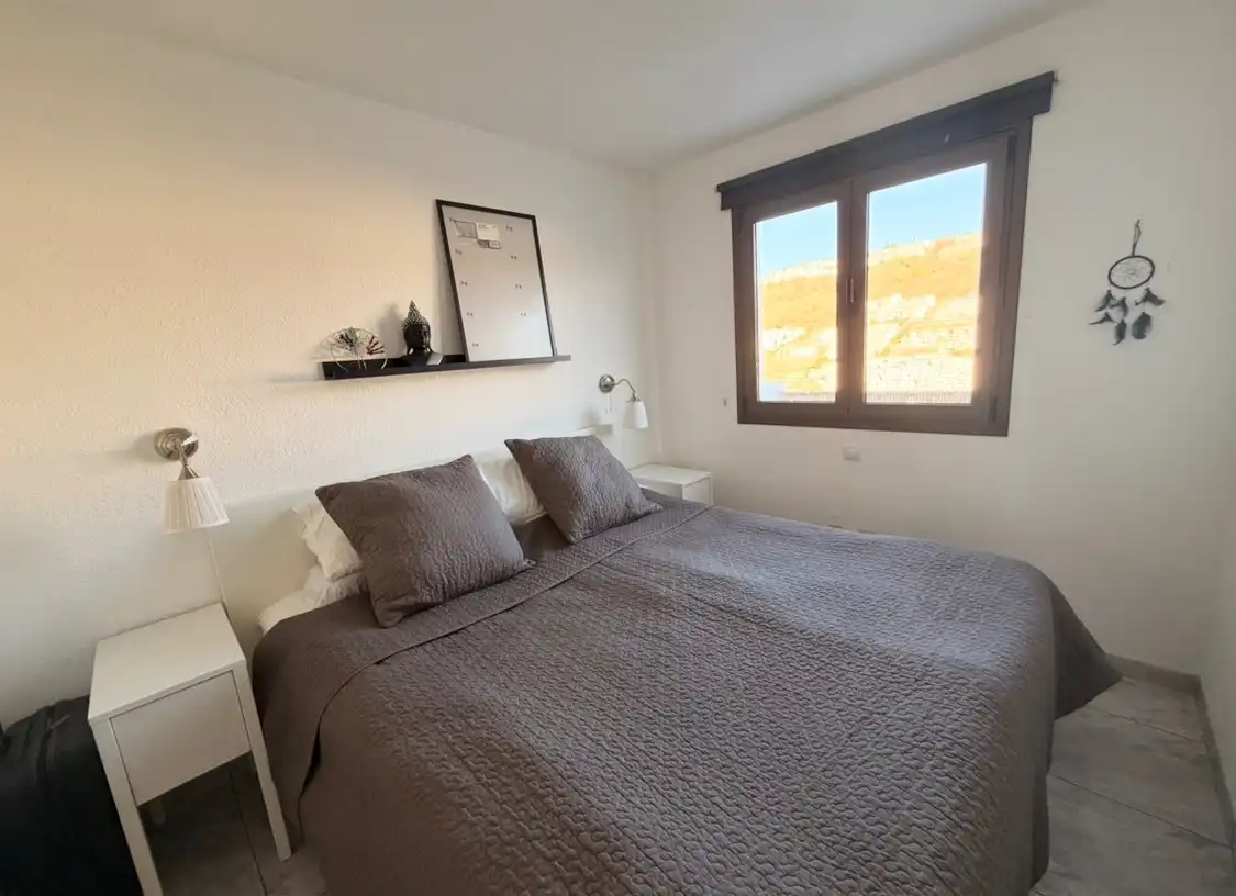 Schlafzimmer von Wohnungen zum Verkauf in Mogán mit Klimaanlage, Terrasse und Möbliert