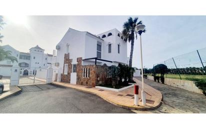 Exterior view of Single-family semi-detached for sale in Roquetas de Mar  with Air Conditioner, Terrace and Swimming Pool