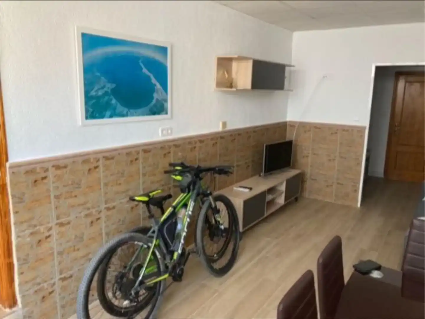 Sala d'estar de Planta baixa de lloguer en La Manga del Mar Menor amb Aire condicionat, Piscina i Moblat