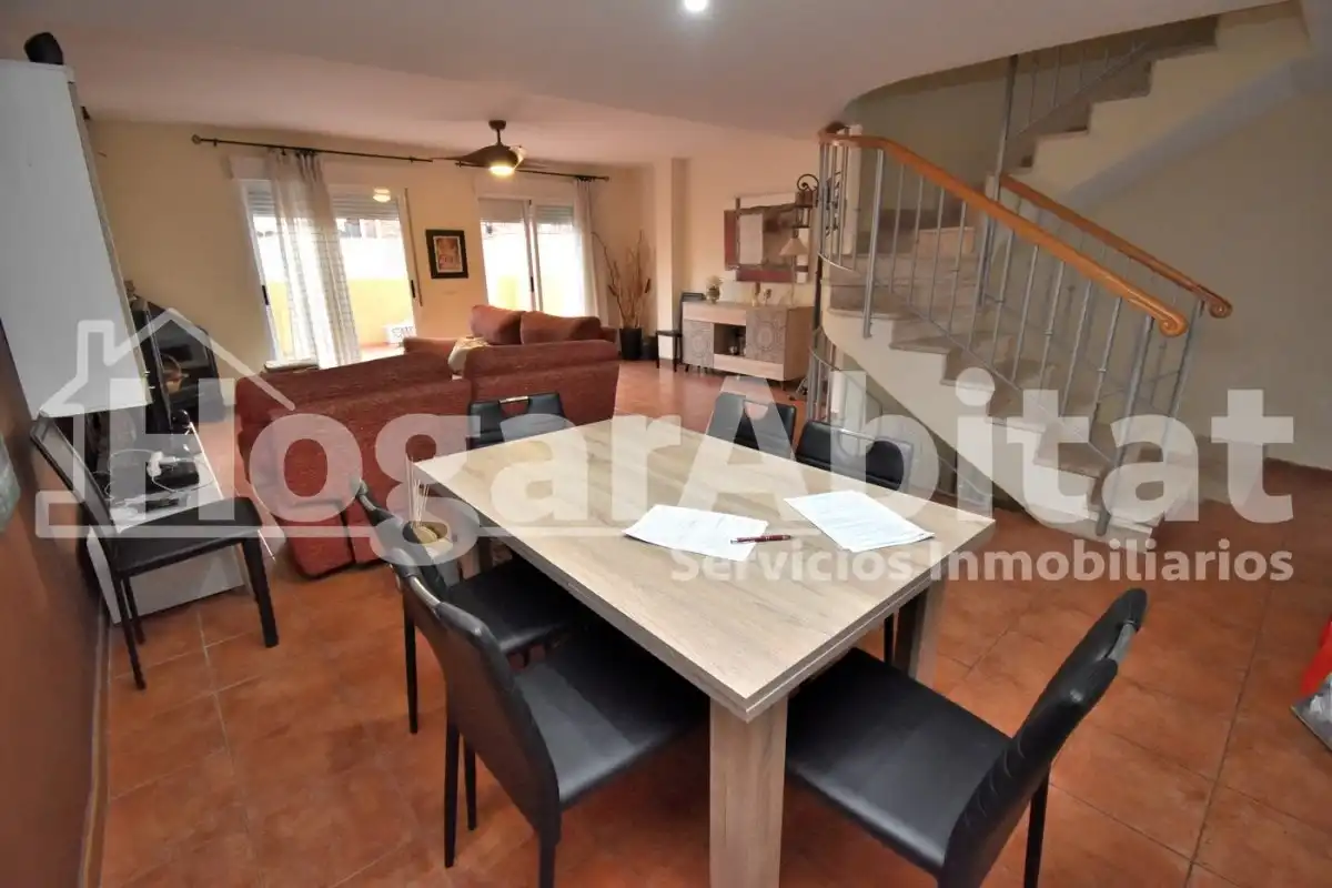 Sala d'estar de Casa adosada en venda en Burriana / Borriana amb Jardí privat, Terrassa i Piscina comunitària