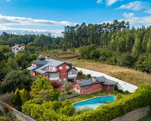 Vista exterior de Casa o xalet en venda en Santiago de Compostela  amb Piscina