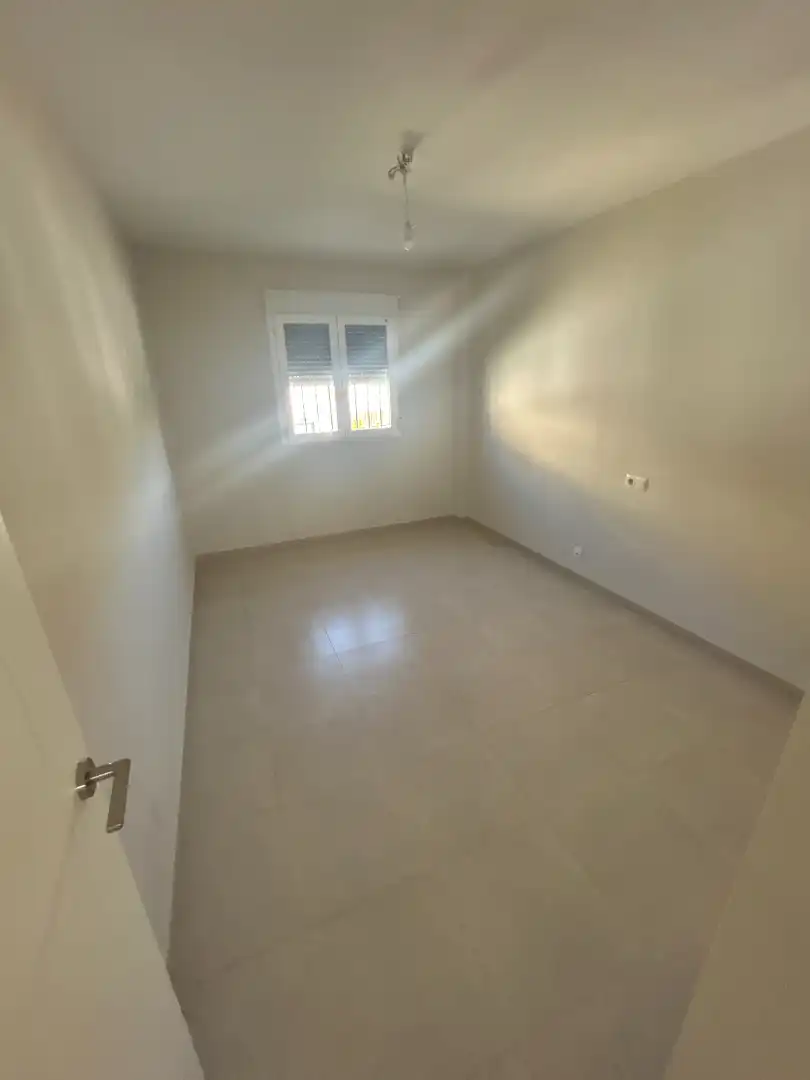 Dormitori de Casa adosada en venda en Vélez-Málaga amb Aire condicionat, Calefacció i Jardí privat