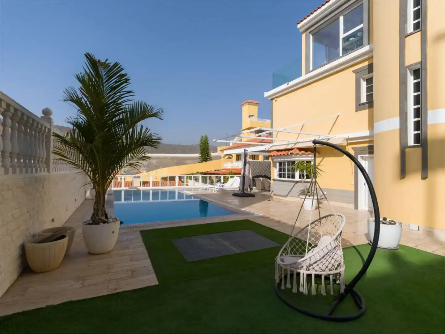 Terrassa de Casa adosada en venda en Mogán amb Aire condicionat, Piscina i Balcó