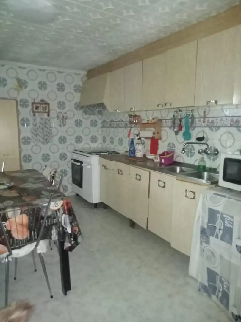 Cuina de Casa adosada en venda en Monóvar  / Monòver amb Jardí privat, Terrassa i Balcó