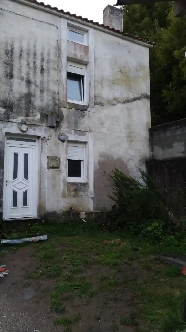 Casa amb jardí en venda a Cariño