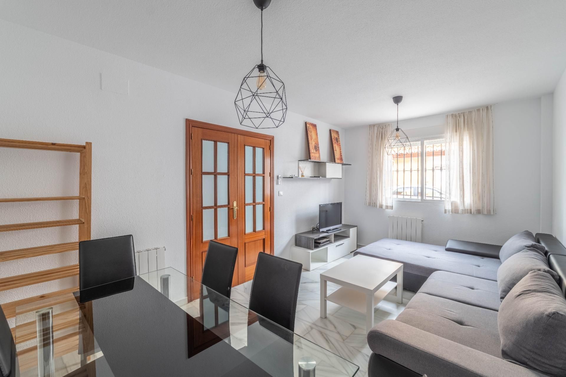 Sala de estar de Casa adosada en venta en Armilla