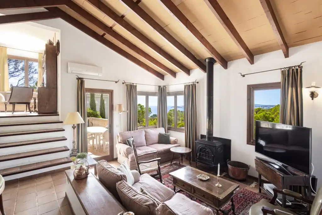 Sala d'estar de Casa o xalet en venda en Calvià amb Aire condicionat, Jardí privat i Terrassa