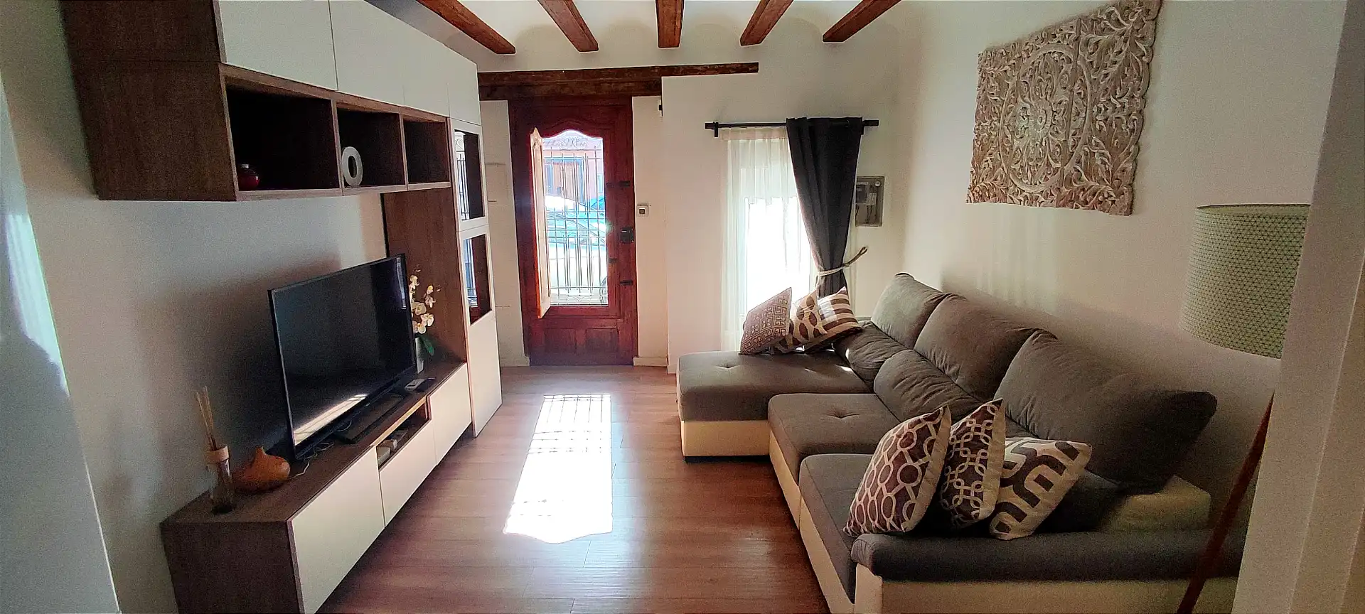 Sala d'estar de Casa adosada en venda en Valencia amb Aire condicionat
