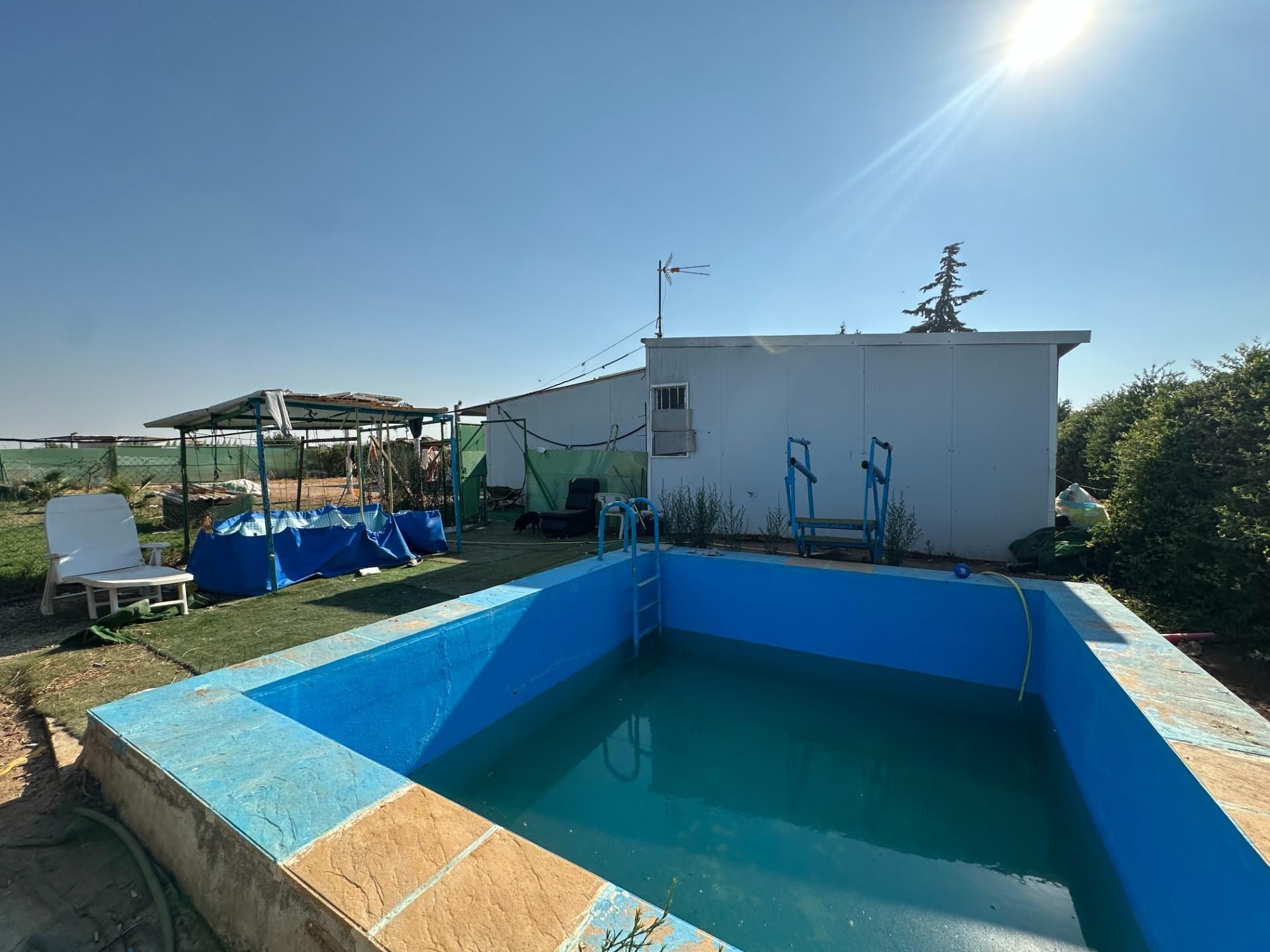 Swimming pool of House or chalet for sale in Utrera