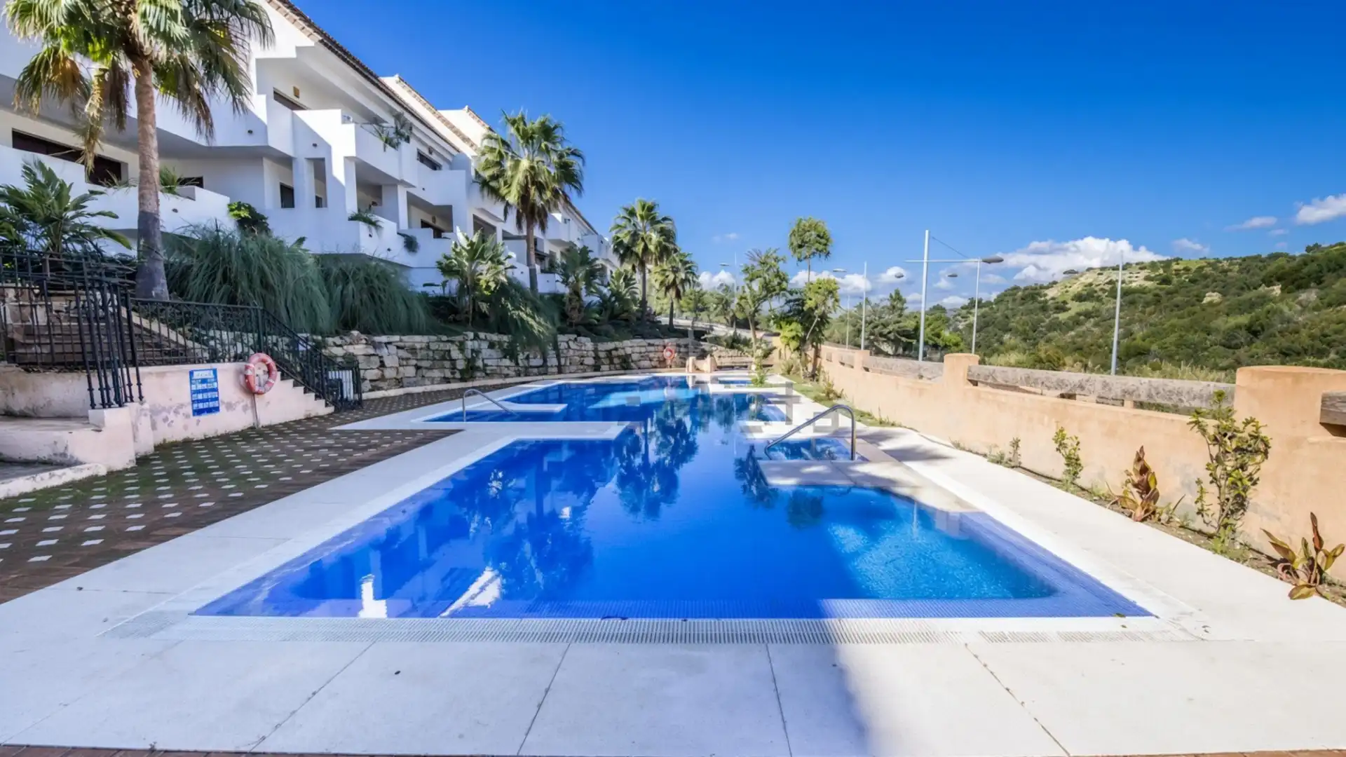 Swimming pool of Attic for sale in Manilva  with Air Conditioner, Terrace and Storage room