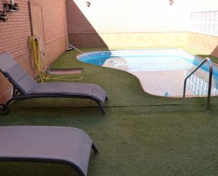 Swimming pool of Single-family semi-detached for sale in  Almería Capital  with Air Conditioner, Private garden and Terrace