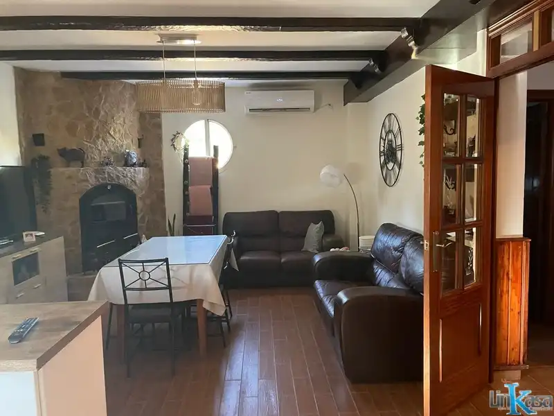 Sala d'estar de Casa o xalet en venda en Linares amb Jardí privat, Piscina i Moblat