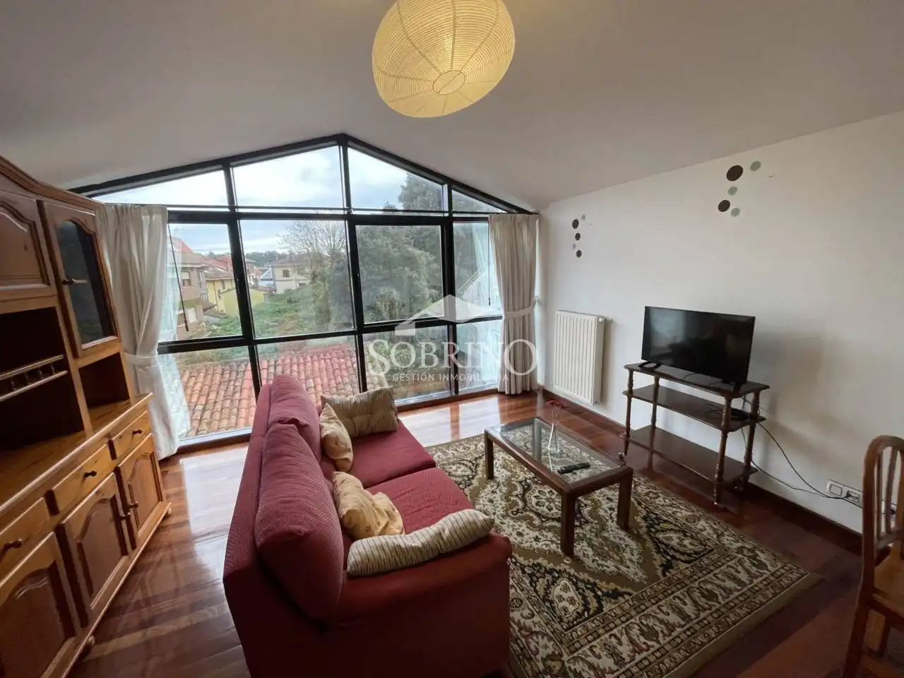 Sala de estar de Piso en venta en Llanes con Calefacción