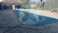 Swimming pool of House or chalet for sale in Badajoz Capital  with Air Conditioner, Terrace and Swimming Pool