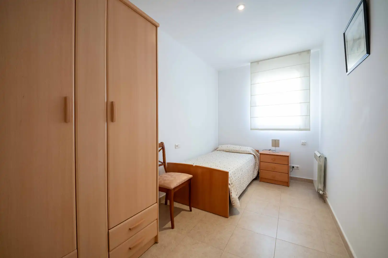 Schlafzimmer von Wohnung zum Verkauf in Calella mit Klimaanlage und Balkon