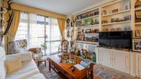 Living room of Flat for sale in  Madrid Capital  with Heating, Terrace and Community pool