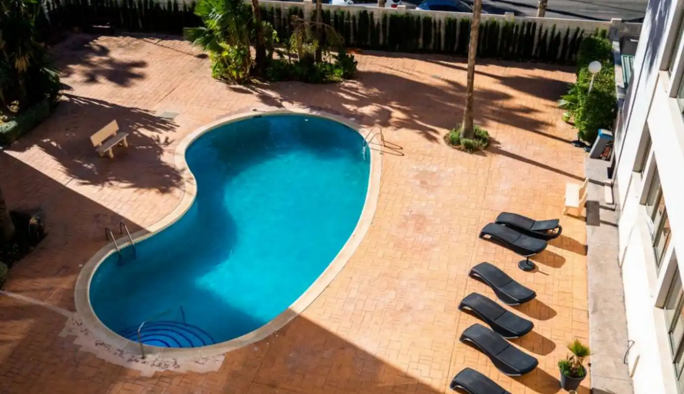 Piscina de Apartamento en venta en Calpe / Calp con Aire acondicionado, Calefacción y Jardín privado