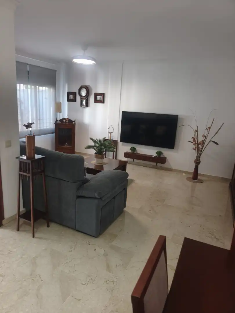 Sala d'estar de Casa adosada en venda en Melilla amb Aire condicionat, Jardí privat i Terrassa